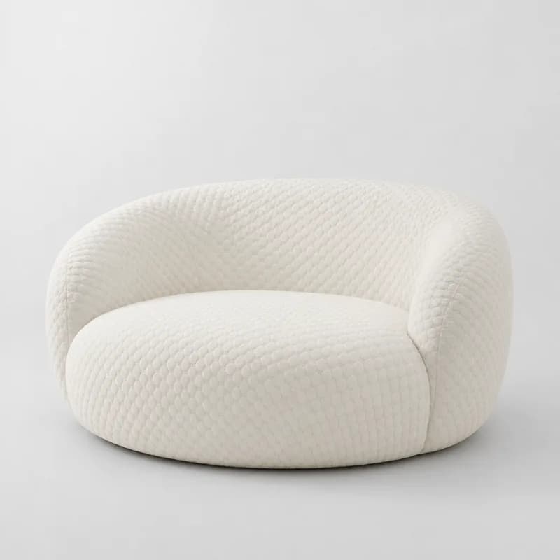 Rounded sofas, quilted fabric